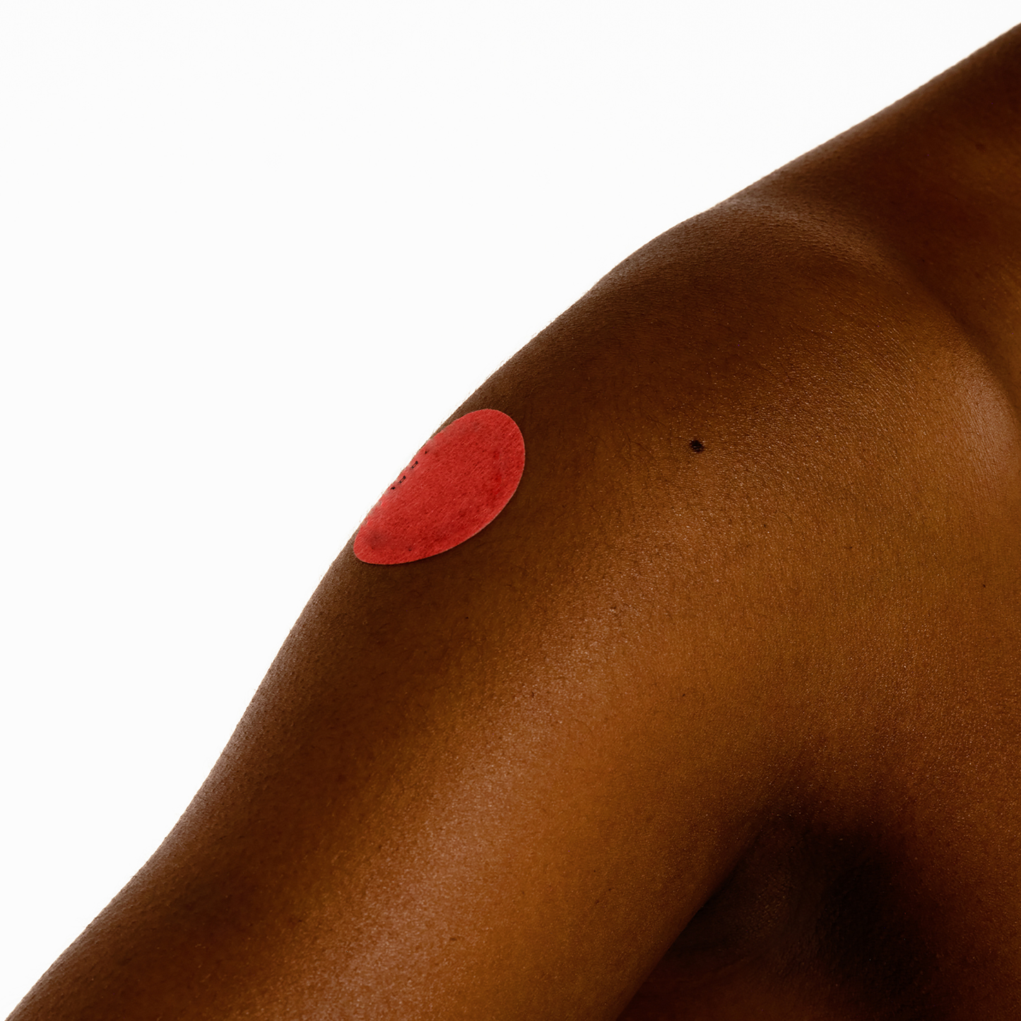 Love Patch applied on upper arm for discreet daily support