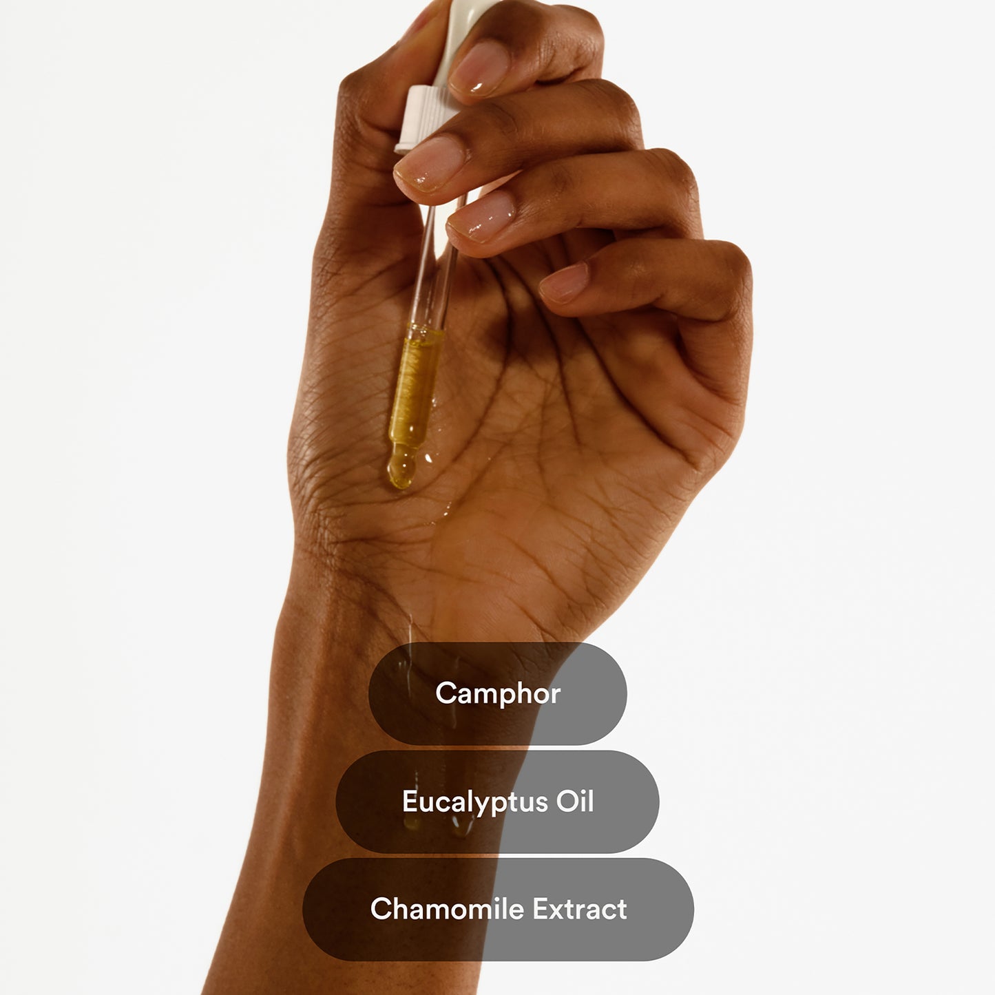 Hand holding herbal ingredients of Period Relief Patches