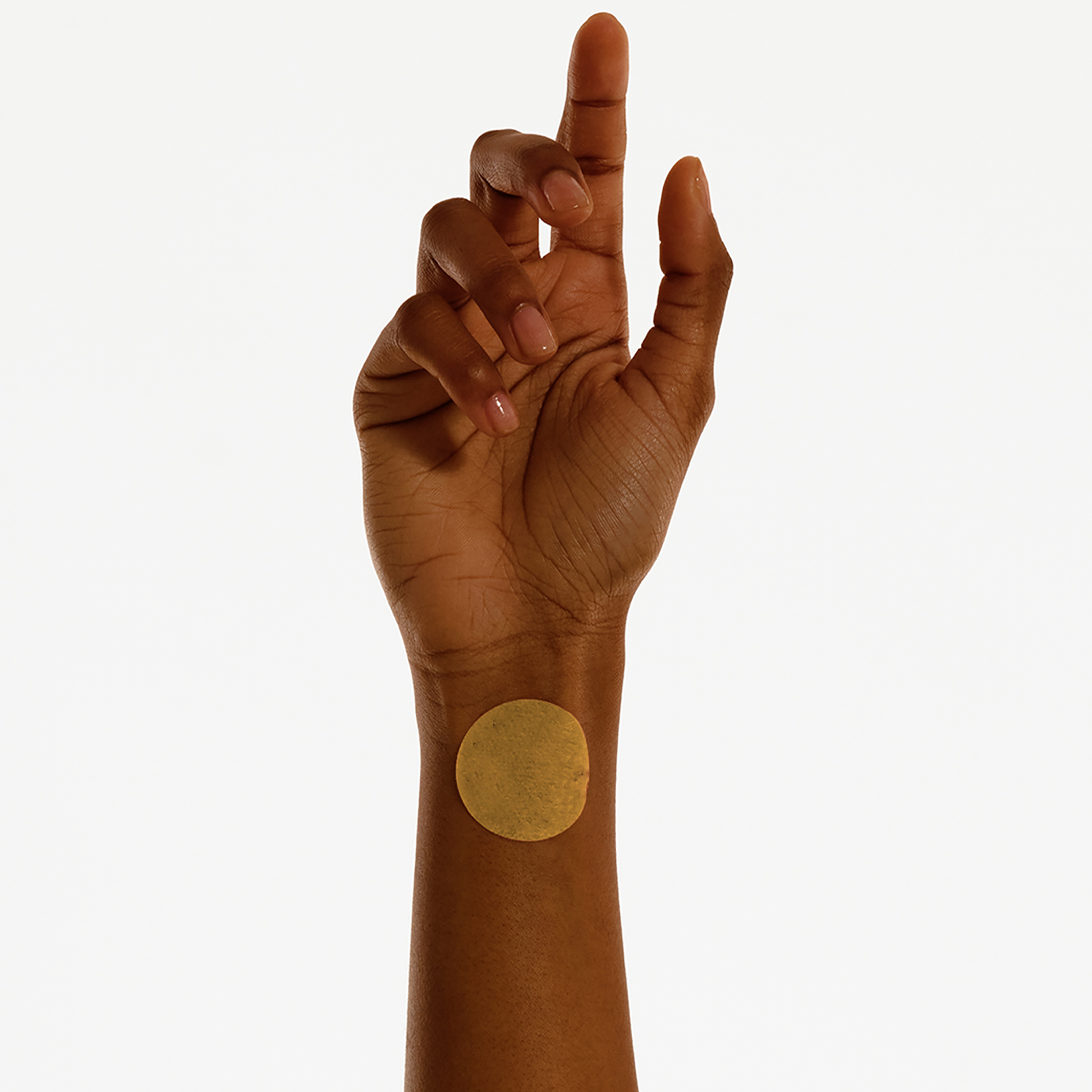 Applying Collagen Patch on wrist for skin nourishment