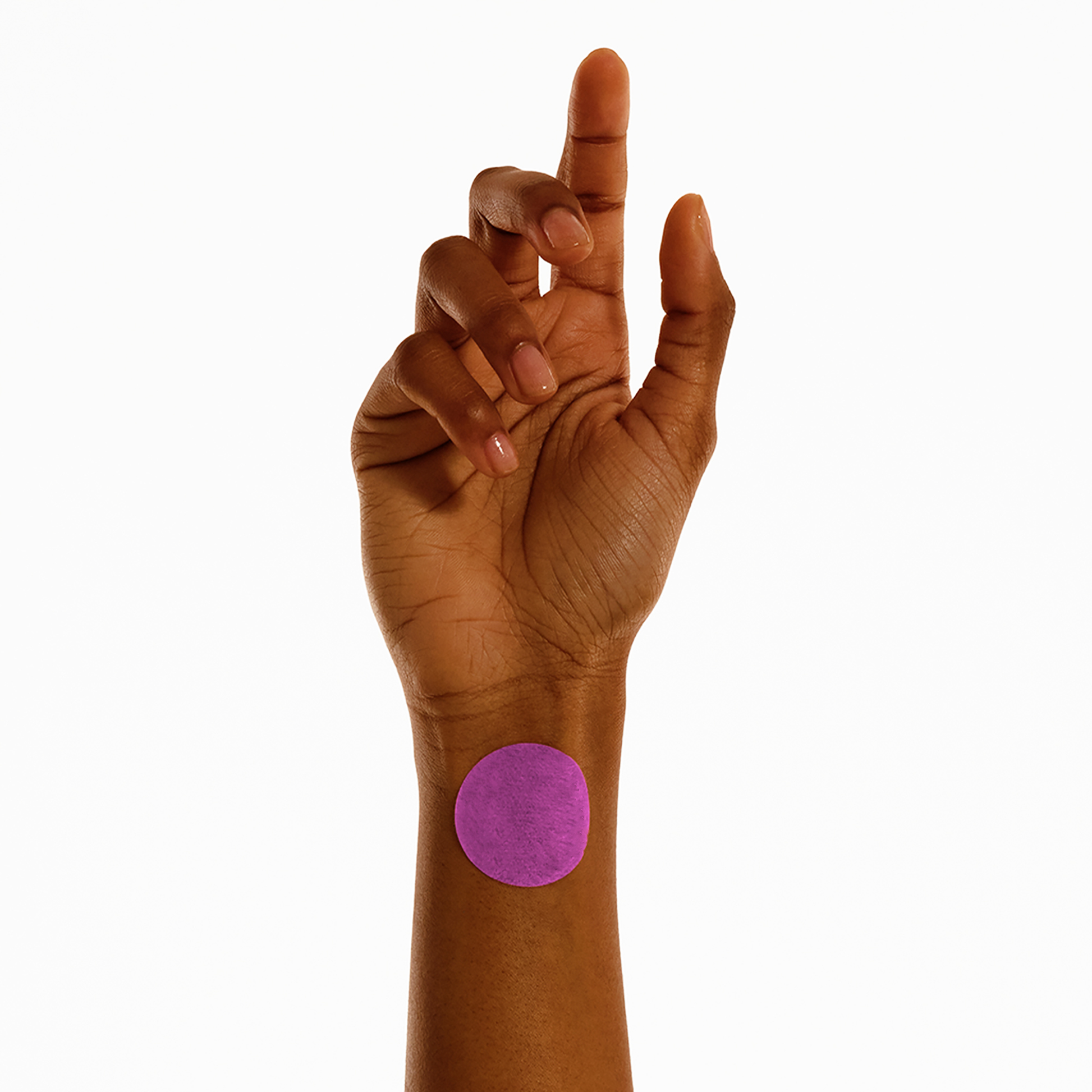 Person wearing Menopause Patch on wrist for symptom relief